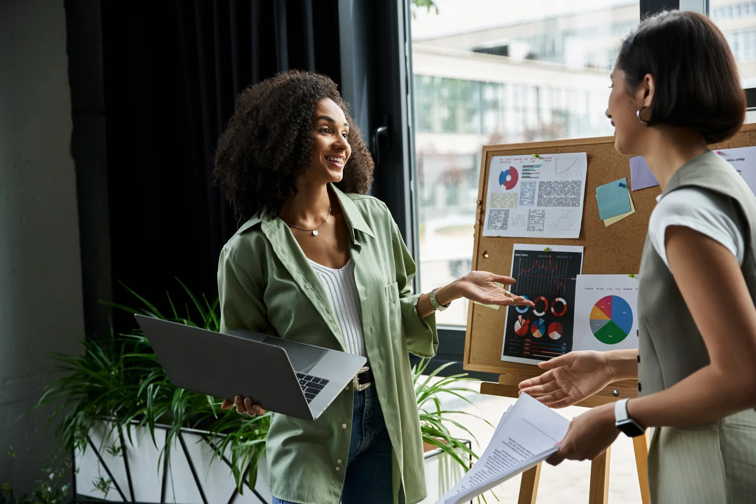 two women discussing about promotional trends for their business